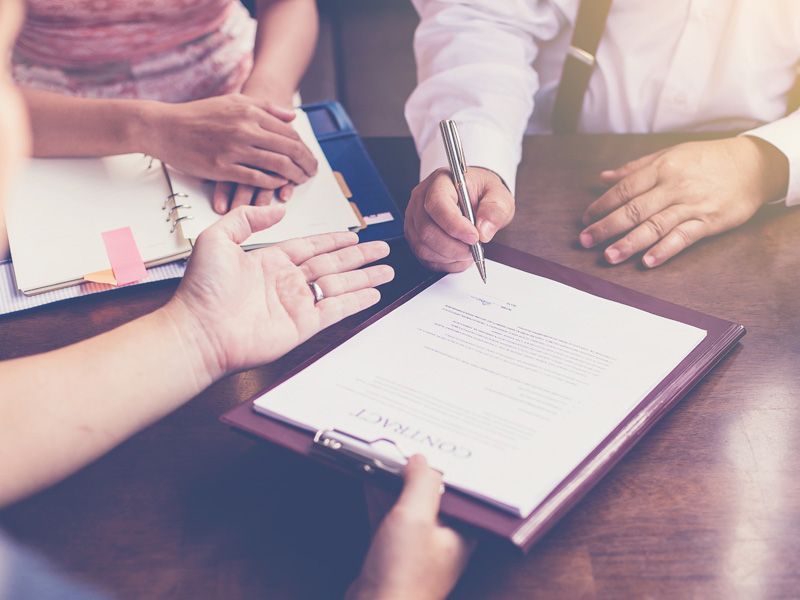 businessman sign in contract with partnership in meeting