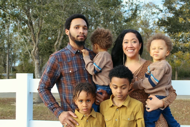 family smiling for picture