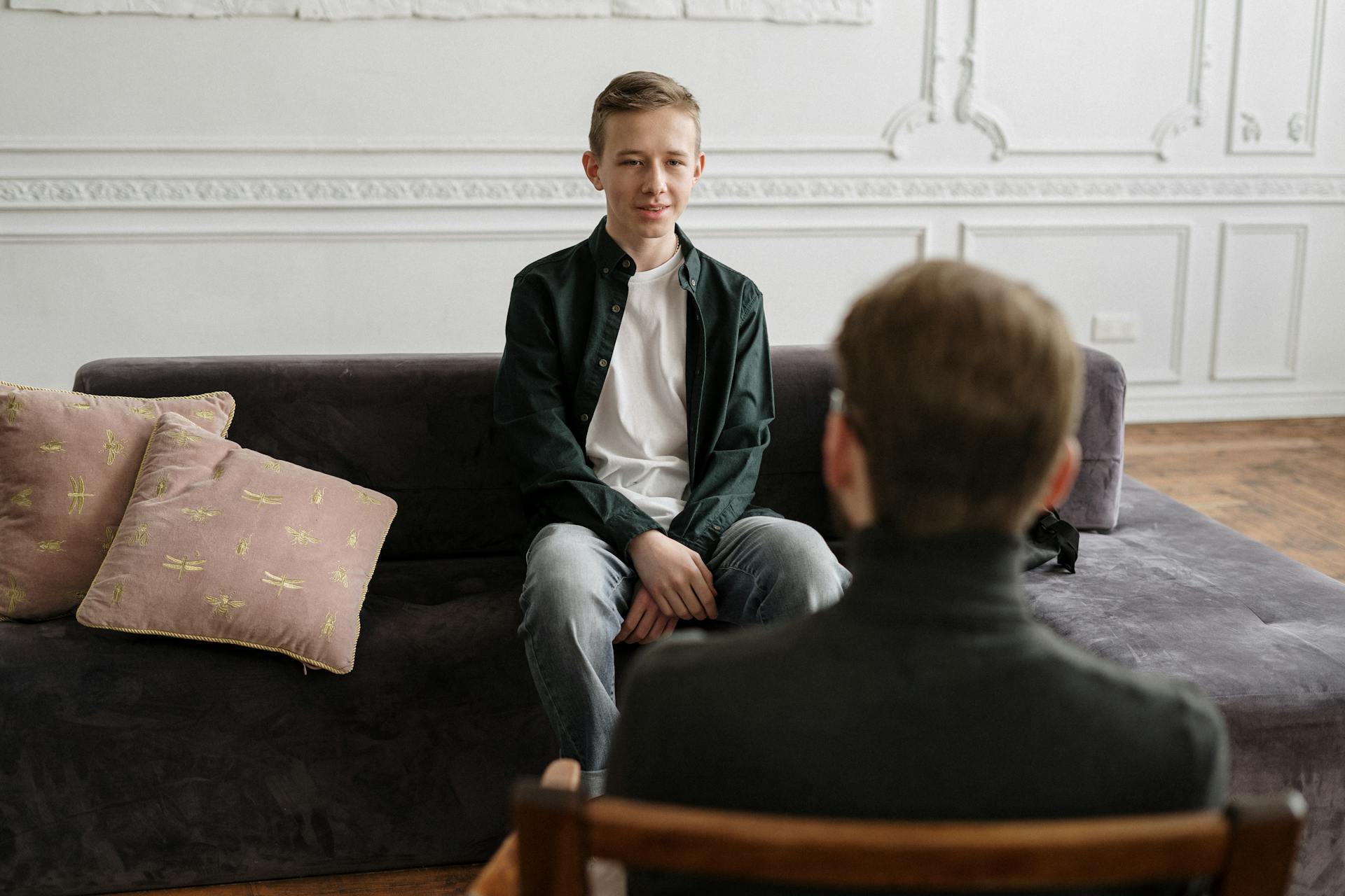 teen talking with adult