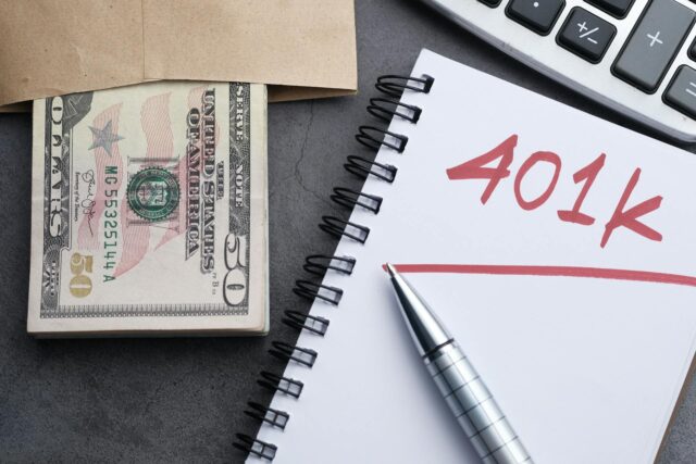401(K)notebook, and money